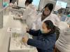 Student performing a simple DNA extraction.