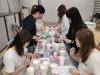 Participants are mixing the materials.
