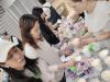 Participants are adding the colors for Diffuser Aromatherapy Flower Pot.