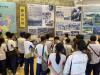 Students are learning about the history of the Dongjiang water supply to Hong Kong and understanding the project's significance for the city's drinking water supply at the Dongshen Water Supply Project Memorial Garden.