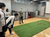 Students are having fun playing Mölkky.