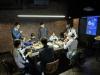8 participants were divided into two groups to play Rummikub with each other.