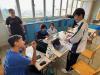 Students are engaged in rigorous discussions about their ideas during the hacking session.