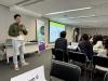 A tutor introduces the concept of ‘design thinking’ to students. 