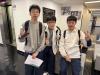 Students have a group photo. 