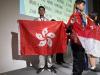 The student proudly carried the HKSAR flag on stage to receive the Silver Honor.