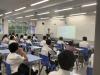 The class teacher is introducing the activity rundown to the students.