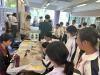 Students have fun at the game booth.