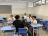 The teacher is listening intently as the student expresses their thoughts.