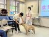 The student is learning to teach an animal to respond through positive reinforcement.