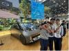Students have a lot of fun in the display room in the Guangzhou Automobile Group Co., Ltd.
