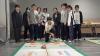 S3 students try floor curling — focus, strategy and teamwork on every delivery.