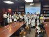 Our students librarian and teachers take a group photo with Ms. Leung Nga Yi. 
