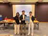 Students take a photo with the guest, Mr Ngan Ka-hing. 