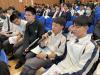 A student asks a question about further studies. 