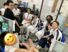 Happy hangout time where students and teachers relax, laugh, and chat together after class