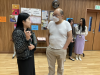Our Vice-principal Ms. Wong having a conversation with a parent.