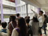 Teachers holding school tour and introducing school facilities to visitors.