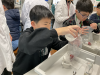 Student performing a simple DNA extraction.