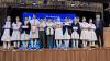 Award recipients proudly receive their scholarships.
