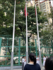 All teachers and students stood respectfully.