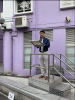 Principal Wong is delivering a speech under the national flag.