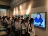Students are reading the exhibits about the Chinese economic reform in Shenzhen Museum.